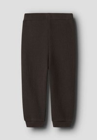 Pantalones de chándal de punto de color marrón oscuro con puños acanalados, una cinturilla elástica y una textura suave. Diseño sencillo sin patrones ni acentos adicionales.