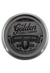 Srebrny metalowy pojemnik z czarną etykietą. Tekst zawiera "Golden," "Bergamot Shaving Cream" oraz "Made in Denmark." Zawiera 100 ml.