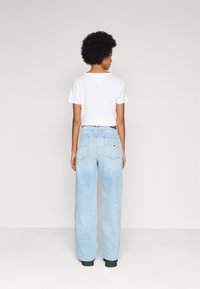Tommy Jeans DAISY JEAN LW BGY BH6110 - Relaxed fit jeans - denim light