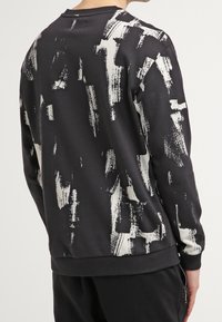 YOURTURN Felpa - black