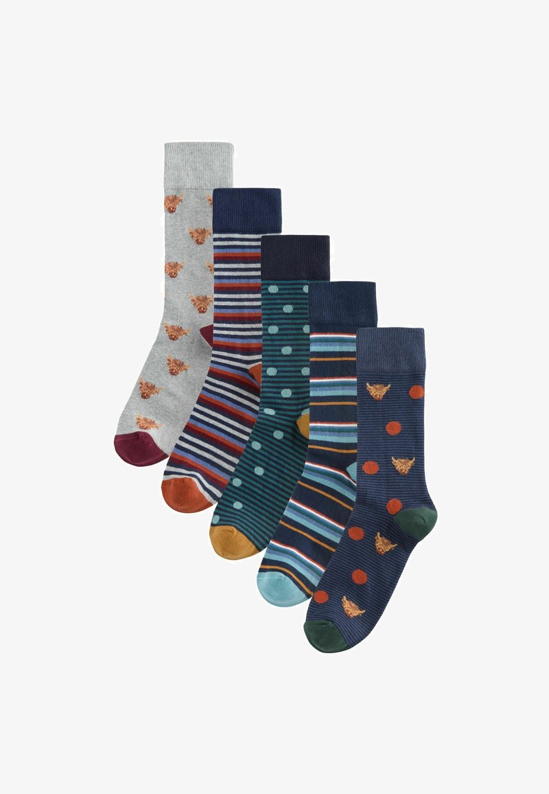 Fünf gemusterte Socken: grau mit braunen Akzenten, marineblau mit grünen Punkten, marineblau gestreift, türkis mit Streifen und marineblau mit roten Punkten.