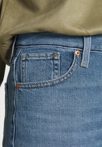 Levi's® HIGH WAISTED MOM JEAN - Mom Jeans - eco blue