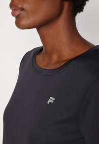 Fila LEONIE - Športne majice - black