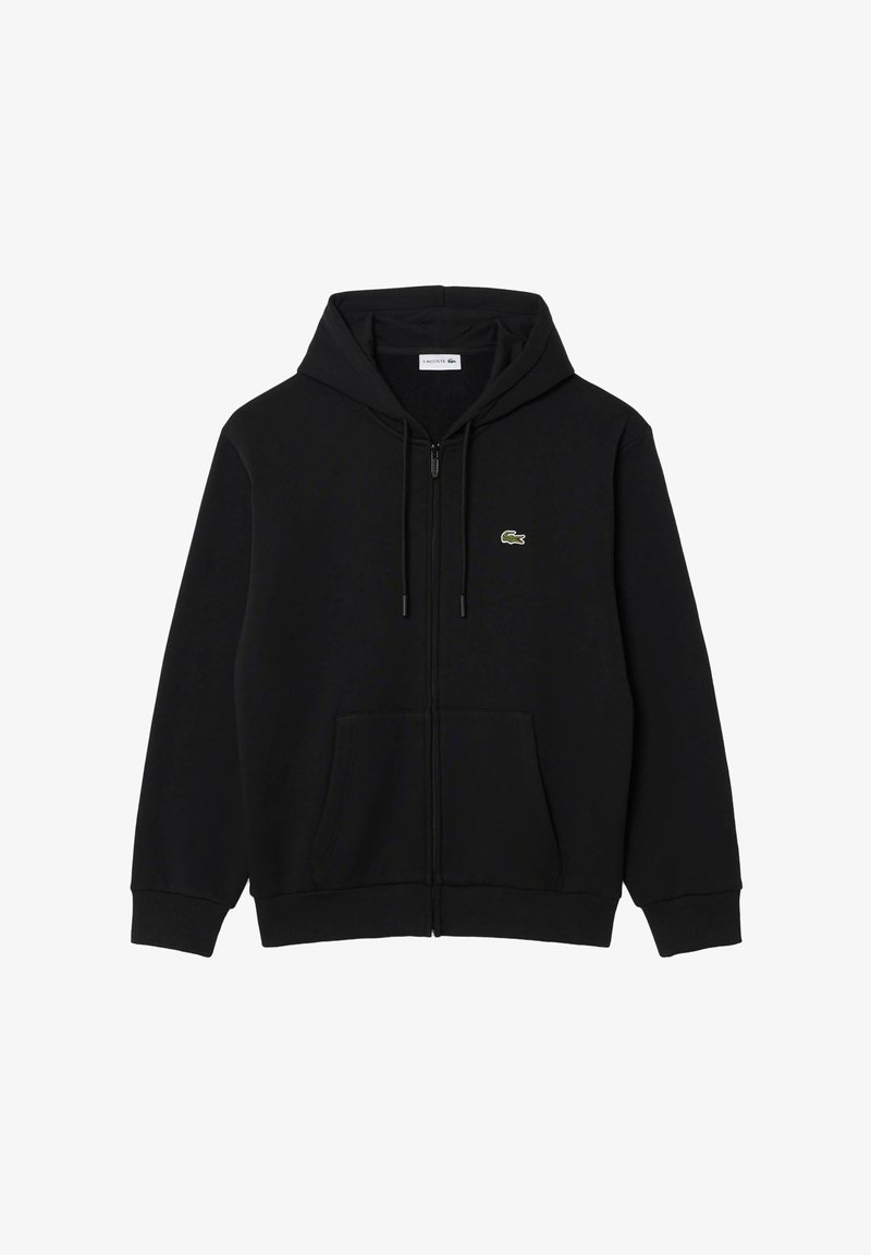 Μαύρο hoodie με φερμουάρ, κορδόνια, μπροστινές τσέπες και μικρό πράσινο λογότυπο κροκόδειλου στο αριστερό στήθος, τοποθετημένο επίπεδα σε λευκό φόντο.