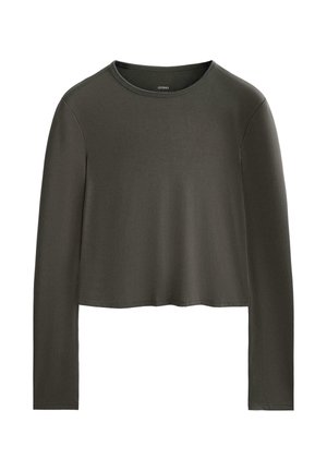 Long-sleeve cropped top in dark olive green, made of soft fabric with a round neckline and no visible fastenings or patterns.
