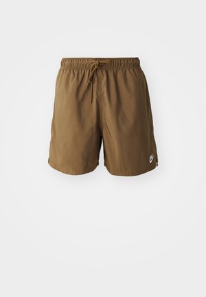Brune svøm shorts lavet af letvægtsstof, med elastisk talje med snor og et diskret Nike-logo på siden.