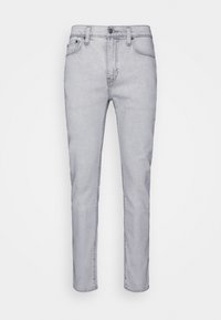 Světle šedé slim-fit džíny s předním knoflíkem a zipem, pěti kapsami a přišitými poutky na pásek.