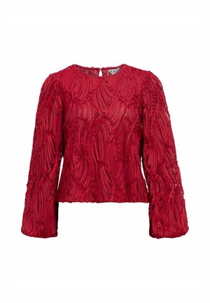 Rote strukturierte Bluse mit langen Ärmeln, Rundhalsausschnitt und einem Schlüssel-ausschnitt hinten. Der Stoff hat ein geschichtetes, gerafftes Muster.