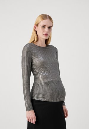 Metallic långärmad topp med horisontella ränder, silver- och svartfärgad, figurnära design som framhäver midjan, mjuk textur.
