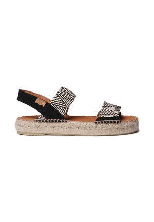 Zwart-witte geweven espadrillesandalen met twee brede banden, een binnenzool van natuurlijk leer en een gevlochten sugrijstzool. Verstelbaar slingback-ontwerp.