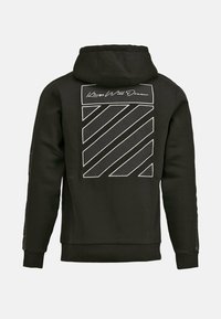 Hoodie noir avec un graphisme au dos comportant des rayures blanches diagonales et la phrase "Kings Well Dream" au-dessus des rayures.