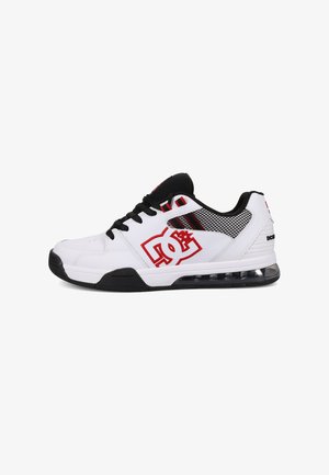 White athletic shoe with black accents, featuring a red logo and mesh inserts. Includes a cushioned sole with visible air chamber.