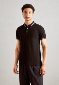 Lindbergh CONTRAST PIPING - Bluză polo - black