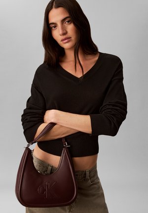 Calvin Klein, BOLD SMALL CRESCENT - Sac à main - dark brown