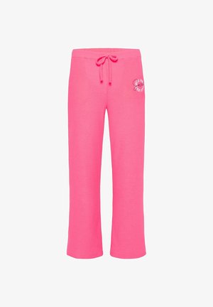 Pink sweatpants made of soft cotton, featuring a drawstring waist, wide legs, and a small embroidered logo on the front.