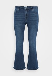 Jeans de mezclilla azul acampanados con una cintura de mediana altura, diseño de cinco bolsillos y una textura ribeteada sutil en la parte frontal. La tela parece resistente y suave.