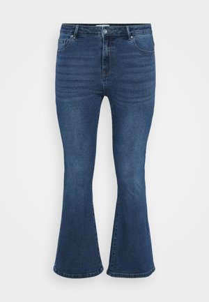 Uitlopende blauwe spijkerbroek met een middelhoog taille, vijf-pocket ontwerp en subtiele geribbelde textuur aan de voorkant. De stof lijkt stevig en glad.