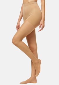 Beige punčocháče do stehen s průhledným vzhledem a vyztuženou špičkou. Mají hladkou, elastickou tkaninu a bezešvý design pro pohodlí.