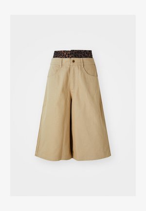 Khaki shorts with a wide leg design and a leopard print waistband. Features front pockets and a button closure. Smooth, textured fabric.