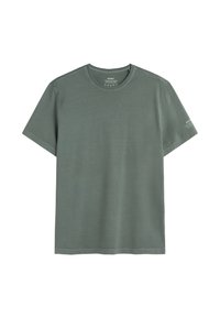 T-shirt manches courtes col rond de couleur verte douce avec texte de la marque sur le col intérieur et petit imprimé blanc sur la manche droite.