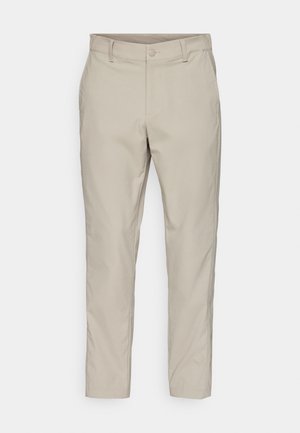Calças de algodão bege com corte reto, fecho de botão e bolsos laterais inclinados. Textura suave com um acabamento limpo.
