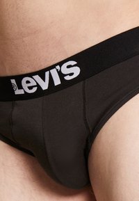 Levi's® SOLID BASIC BRIEF 2 PACK - Slip - jet black