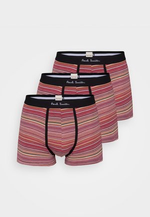 Tre par boxer shorts med et dristig, flerfarget stripemønster, med svart linning og synlig merkeetikett.