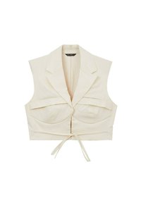 Gilet tagliato in tessuto beige chiaro con colletto strutturato, cuciture sul busto anteriore e chiusura a laccio in vita. Design senza maniche.