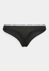Thong en coton noir avec une ceinture blanche arborant le logo "TOMMY HILFIGER". Texture lisse, design classique et couverture minimale.
