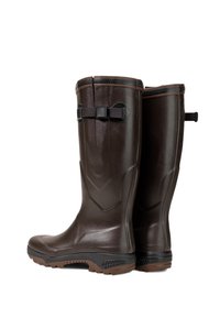 Brown waterproof rubber boots with a textured finish, a curved design, adjustable strap detail, and a rugged sole for traction.