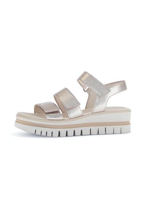 Metallic silver sandals with three adjustable straps, a thick platform sole, and a textured white rubber base for traction.
