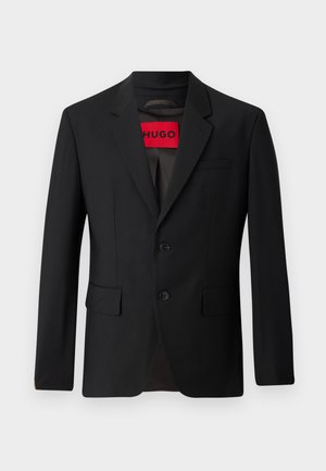 Black blazer with two buttons, notch lapels, and flap pockets. Lined with a red label reading "HUGO." Smooth fabric with a tailored fit.