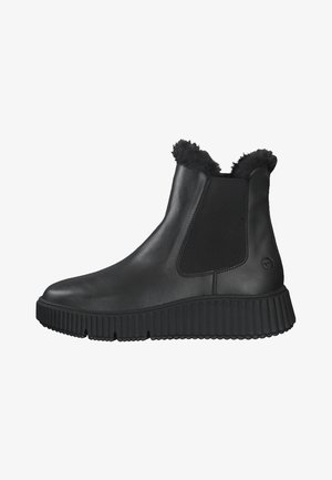 Bottes noires en cuir montantes avec une semelle texturée et nervurée, des panneaux latéraux élastiques et un col en fourrure douce. Surface lisse avec des accents minimaux.
