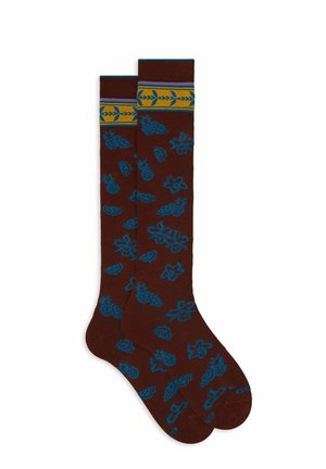 Brown knee-high socks featuring a repeated pattern of blue flowers and pineapples. The top band has yellow and purple horizontal stripes.