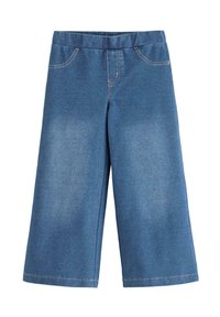 Denim culottes sinisenä, keskikorkealla vyötäröllä, kahdella etutaskulla ja suoralla leikkauksella, joka päättyy nilkan ylle. Haalistunut pinta.