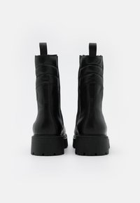 Vagabond COSMO - Platform ankle boots - black