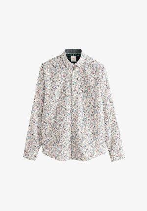 Witte blouse met lange mouwen en een bloemmotief in blauw, rood en oranje. Voorzien van een button-down kraag en een textuur aan de binnenkant van de halsband.