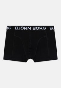 Fekete boxer nadrág pamutból, rugalmas derékpánttal, rajta fehér "BJÖRN BORG" felirattal. Sima textúra és testhezálló dizájn.