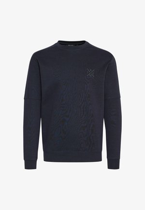 Sudadera azul marino con cuello redondo, mangas largas, tejido texturizado y un logotipo tonal en el pecho. Acabado suave, diseño casual.