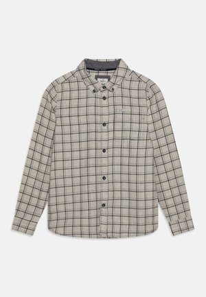 Beige langærmet skjorte med knapper, sort ternet mønster, knappet krave, brystlomme og sorte knapper ned foran.