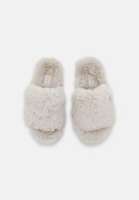 Faux fur slippers in light gray with a soft, plush texture. Open-toe design featuring a wide band across the foot and a flat sole.