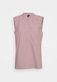 Blouse sans manches rayée rouge et blanche, avec un décolleté en V et une coupe décontractée, fabriquée en tissu léger.