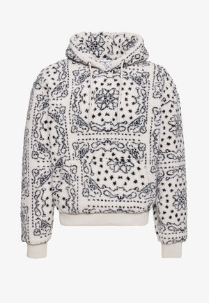 Sudadera con capucha de sherpa blanco con estampado de bandana negro, bolsillo canguro delantero, capucha con cordón y puños y dobladillo acanalados.