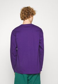 Carhartt WIP CHASE - Hosszú ujjú felső - tyrian