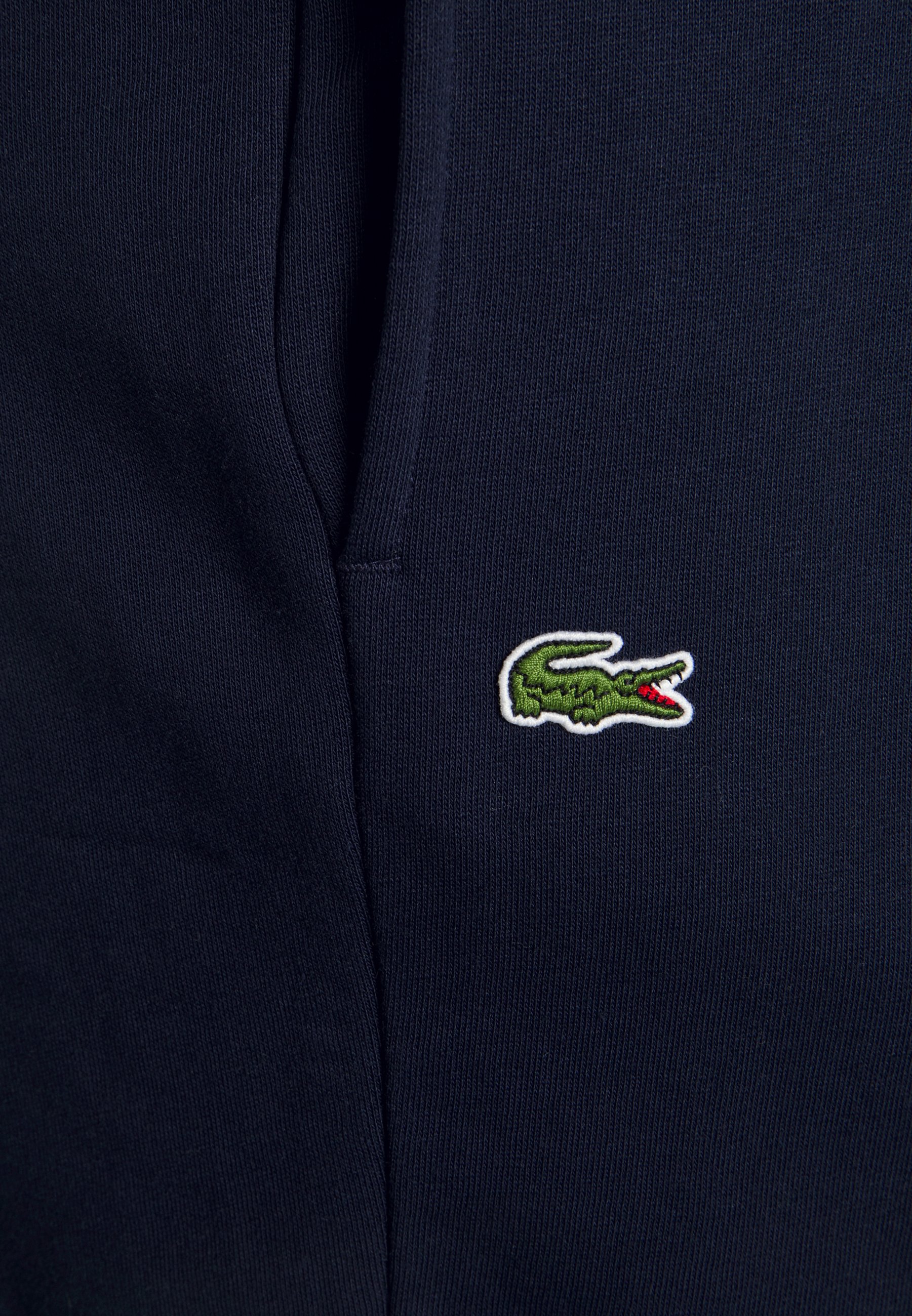 Lacoste PLUS - Tracksuit bottoms - navy 
