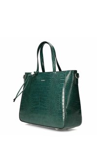 Sac fourre-tout en cuir verni de crocodile vert foncé avec deux poignées, quincaillerie argentée et un détail de nœud décoratif sur le côté.