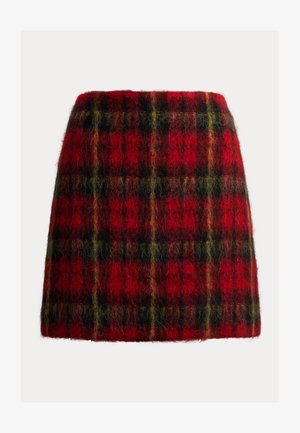 Red tartan skirt made of wool with a soft texture, featuring a plaid pattern in black and green accents, cut in a straight shape.