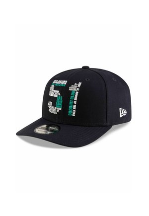 Black cap with a structured design, featuring assorted white and teal text detailing achievements. Curved visor and adjustable snapback closure.