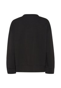 Felpa nera oversize con scollatura tonda, maniche lunghe e polsini a coste. Texture liscia con dettagli di cucitura sottili all'orlo.