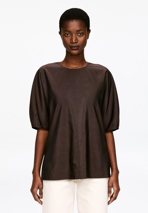 Brown puff-sleeve top with a round neckline, made of smooth fabric. Features a simple, structured design without patterns or embellishments.